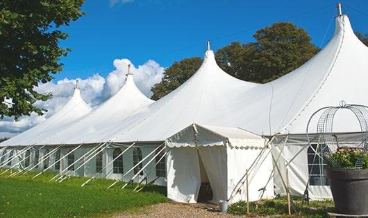 multiple portable restrooms for large-scale events, ensuring availability for all guests in Blackstone